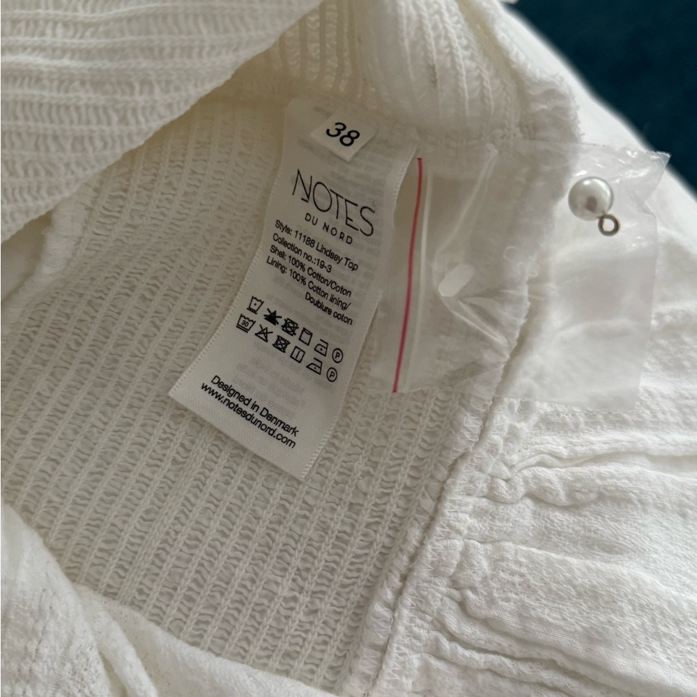 Women's White Ruffled Top with Pearl Buttons - Picture 5 of 5
